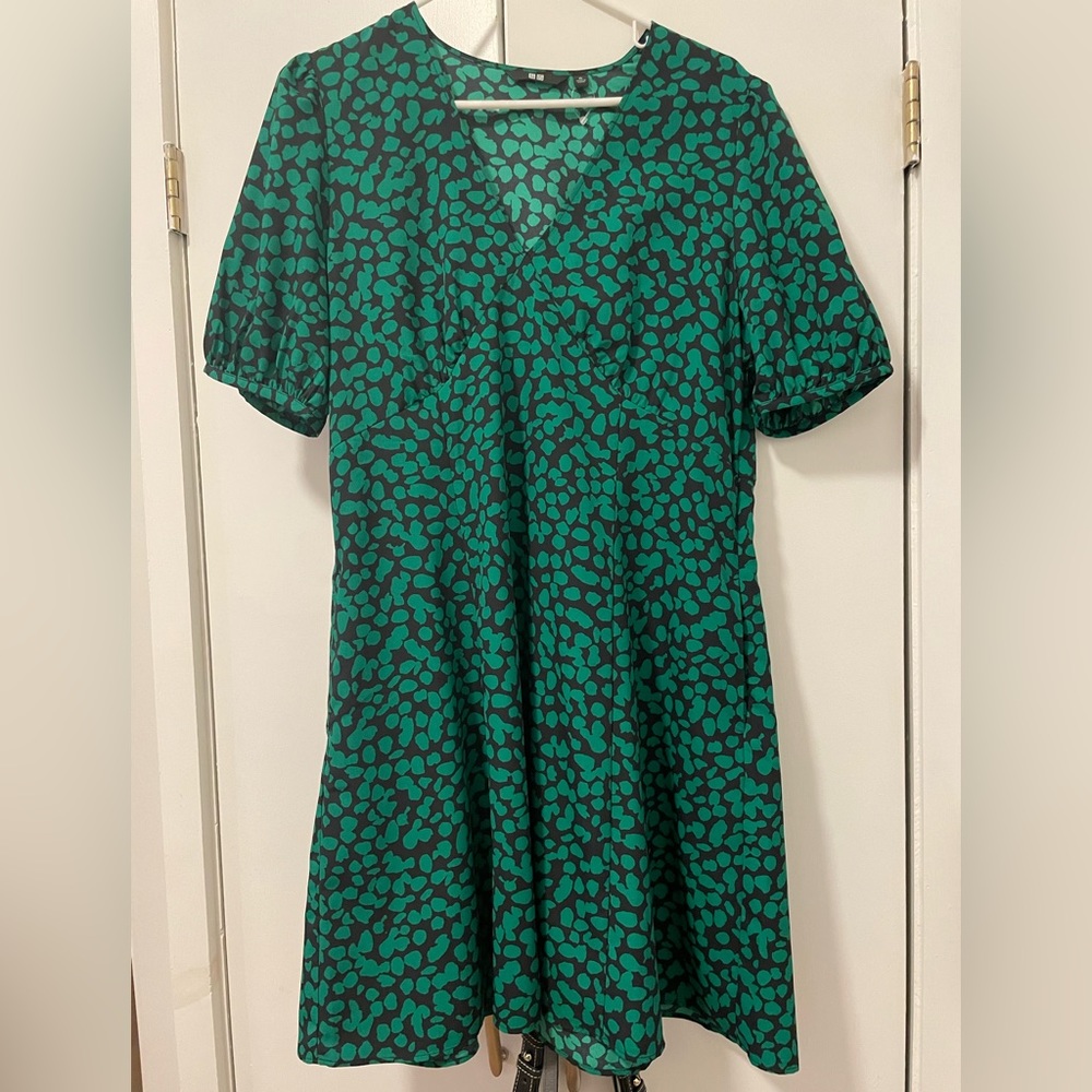 Green and black side-zip dress